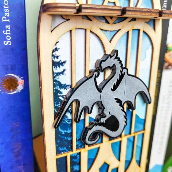 décoration bibliothèque dragon pendule Arboria