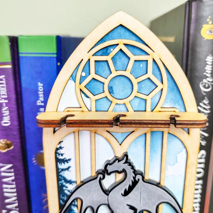 décoration bibliothèque dragon pendule Arboria